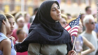 130420124125-khera-muslim-woman-with-flag-story-top