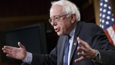 Sen. Bernie Sanders, I-Vt. gestures during a news conference on Capitol Hill in Washington, Friday, Jan. 16, 2015, to discuss Republican efforts to cut Social Security and Medicare and other programs that have an impact on working families. Sanders, an independent who caucuses with Democrats, became the ranking minority member on the Senate Budget Committee when the new GOP-controlled Congress began. (AP Photo/J. Scott Applewhite)