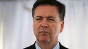 MIRAMAR, FLORIDA - APRIL 11:  FBI Director James Comey speaks to the media after holding a ceremony to commemorate a shoot-out thirty years after, FBI agents Ben Grogan and Jerry Dove died in a gun battle with two heavily armed suspected bank robbers in Miami-Dade county on April 11, 2016 in Miramar, Florida. The shootout left five other agents wounded and the two serial bank robbers were killed by one of the wounded FBI agents.  (Photo by Joe Raedle/Getty Images)