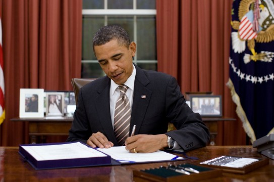 President Barack Obama signs H.R. 2751, the ÒFDA Food Safety Modernization Act,Ó in the Oval Office, Jan. 4, 2011.  (Official White House Photo by Pete Souza)
This official White House photograph is being made available only for publication by news organizations and/or for personal use printing by the subject(s) of the photograph. The photograph may not be manipulated in any way and may not be used in commercial or political materials, advertisements, emails, products, promotions that in any way suggests approval or endorsement of the President, the First Family, or the White House.